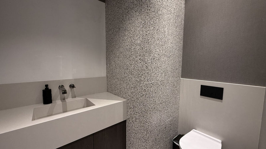 Waterproof, easy-care ceramic that transforms the space in a bathroom in Morin Heights.